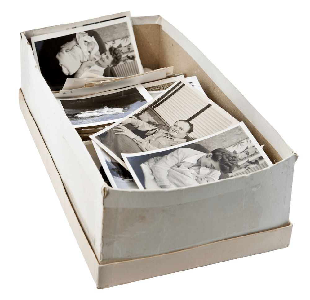 Shoebox of old printed photos ready for photo scanning in Perth